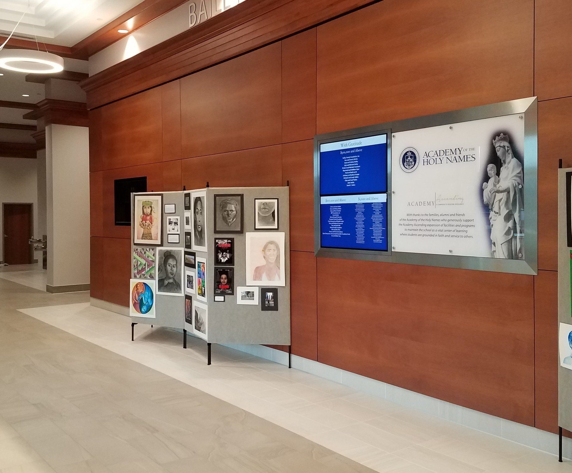 Custom commercial AV install at Academy of Holy Names lobby